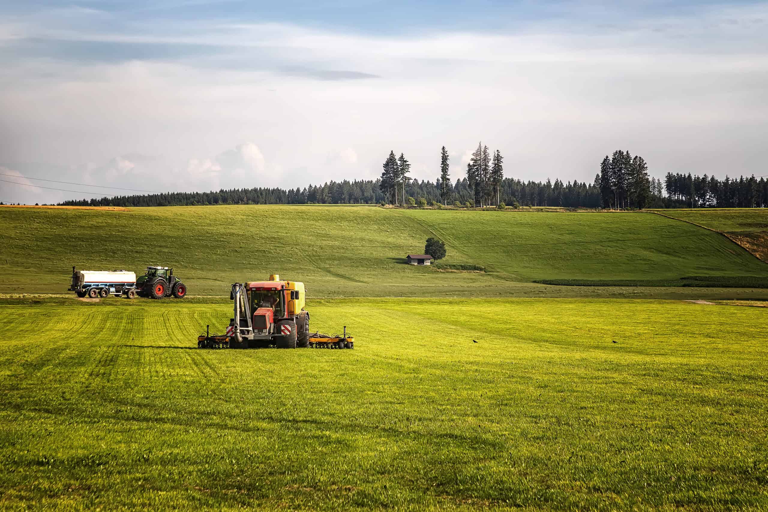 application of manure on arable farmland with the heavy tractor